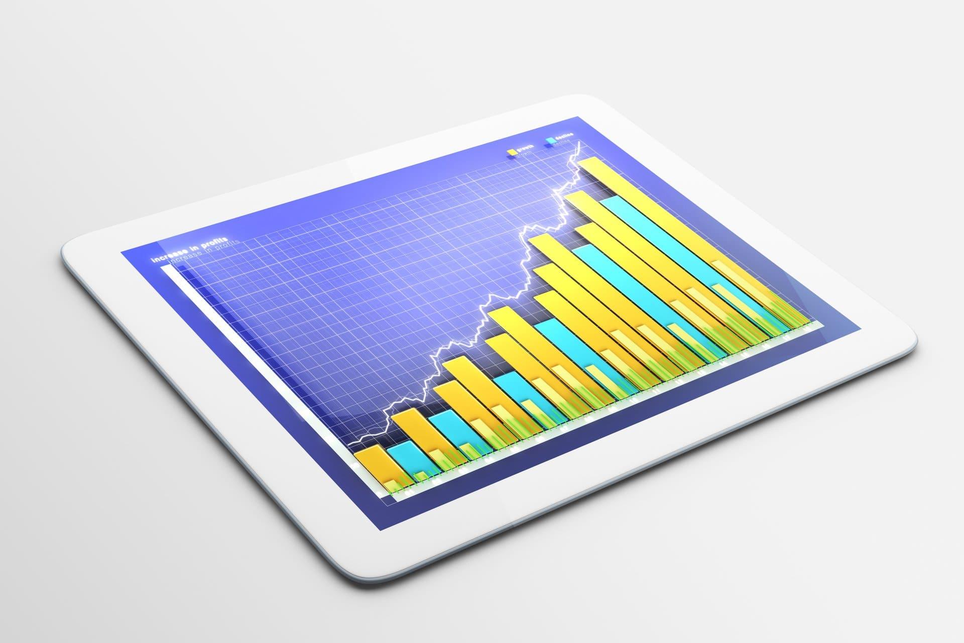 KORVA financial dashboard showing revenue growth on a tablet